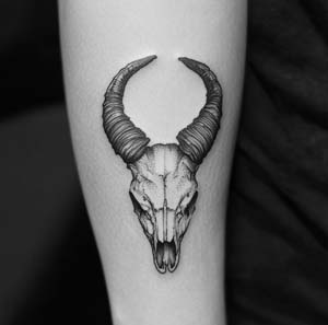 12. Skull Capricorn Tattoo