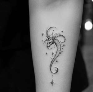 2. Minimal Capricorn Symbol Tattoo