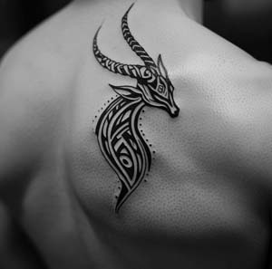 6. Capricorn Tattoo in Tribal Style