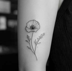 7_Minimalist_Poppy_Flower_Tattoo_On_The_Bicep